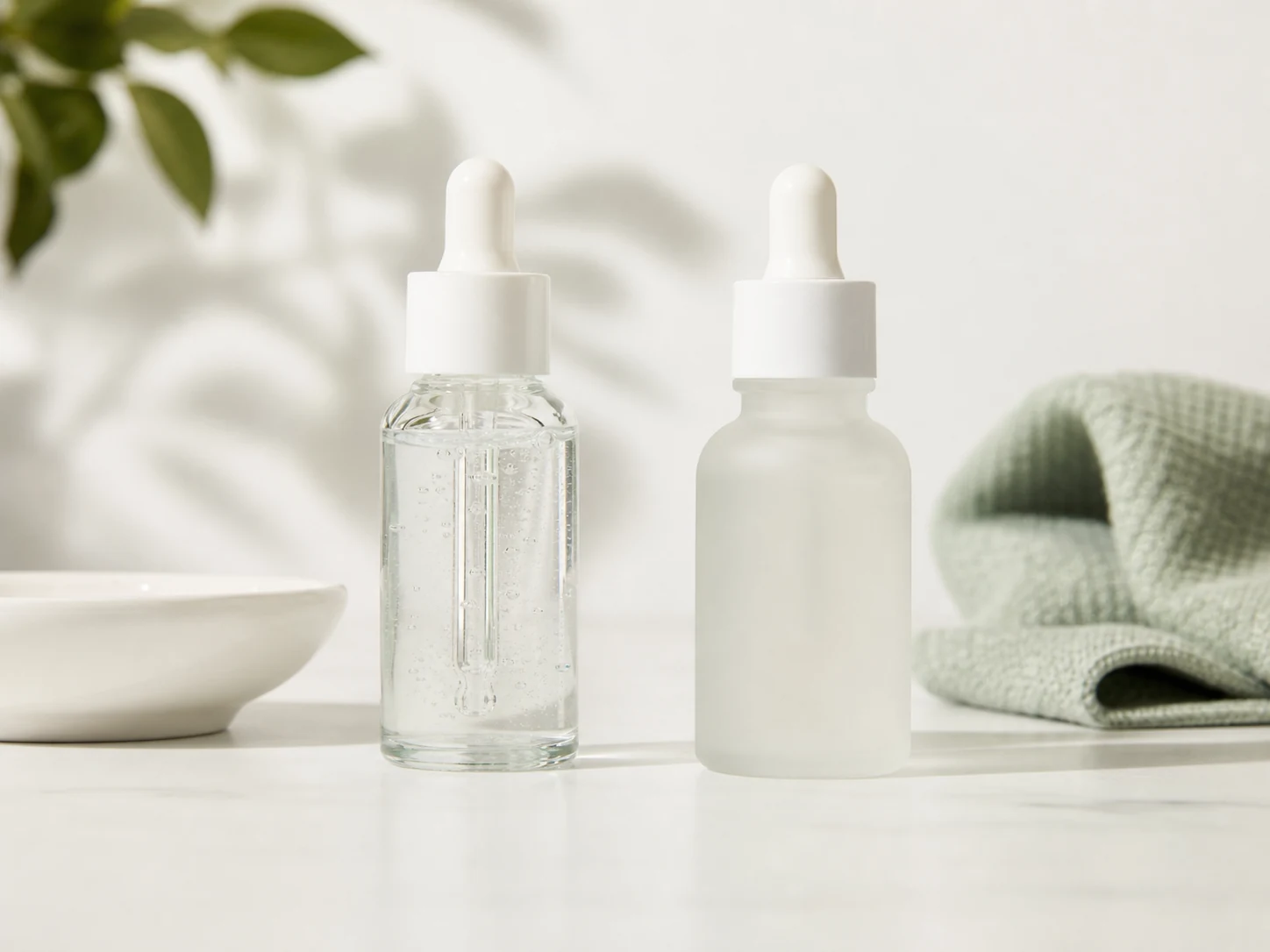 Derma Co and Plum niacinamide serums side by side